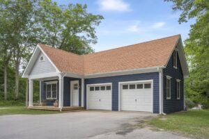 a residential home with asphalt shingle roofing installed